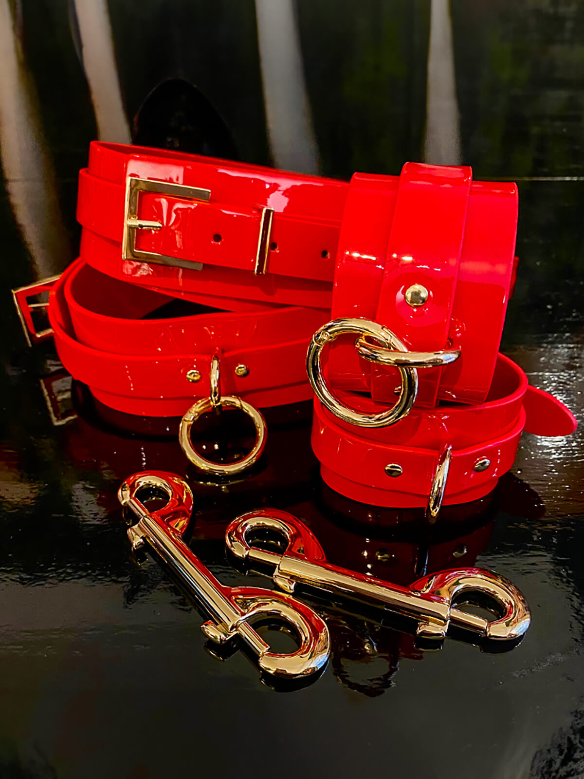 High-gloss handcuffs and thigh cuffs